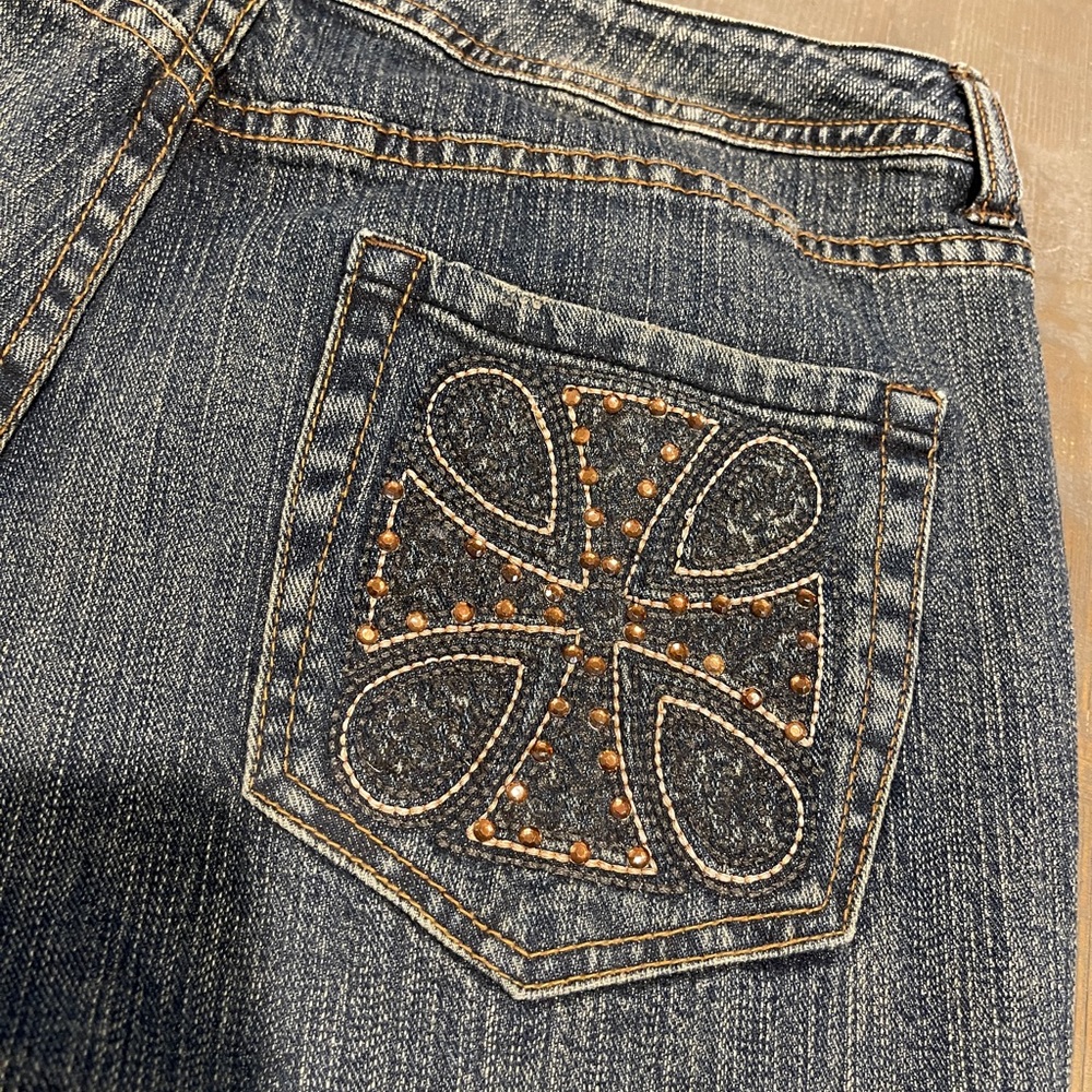 Chico’s platinum cross beaded pocket jeans